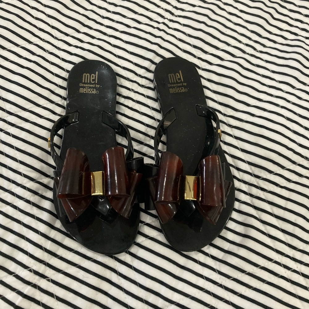 Adorable Mini Melissa sandals just in time for the summer . Gently used